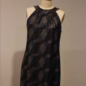 Club attire cocktail dress. Knee length